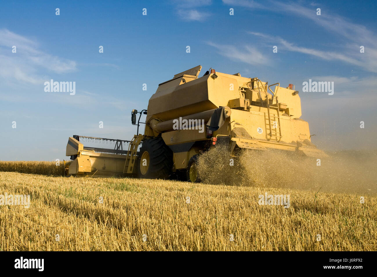 agriculture farming corn cereal harvesting grain combine cultivate railway Stock Photo