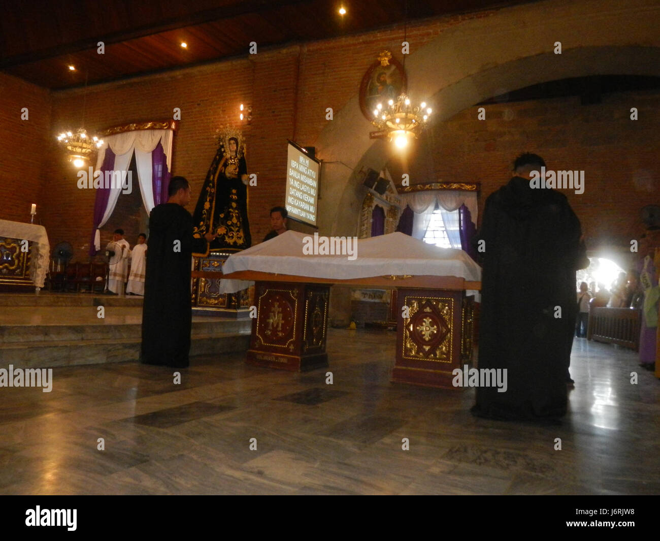 This image shows the Veneration of the Cross ceremony at Santa Monica ...