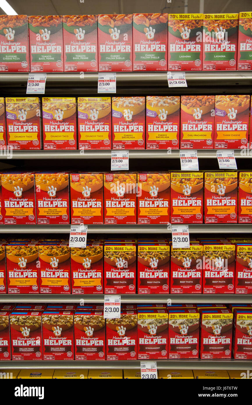 boxes of Hamburger Helper boxed mix on the shelves of a grocery store Stock Photo