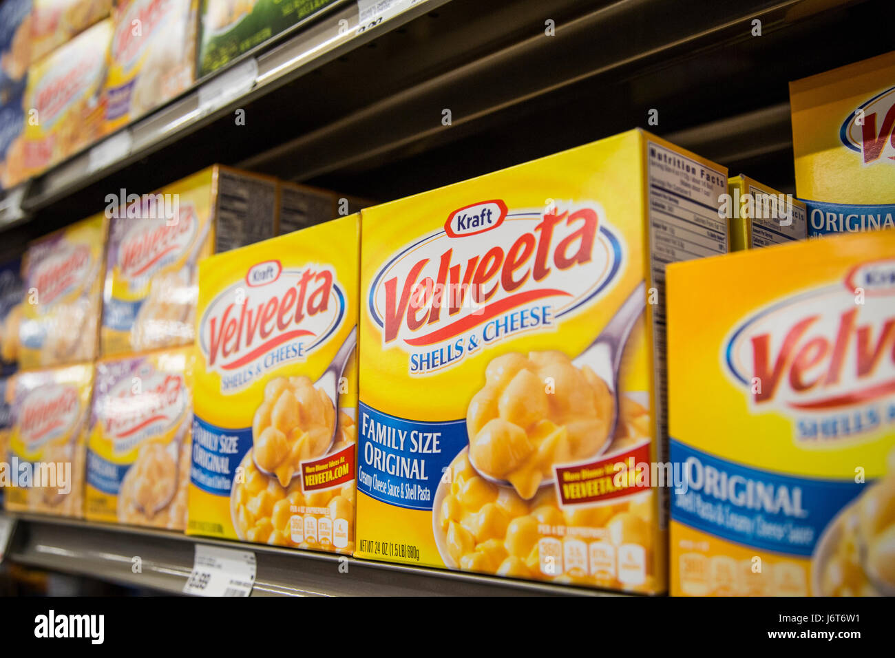 Boxes of Kraft Velveeta brand shells & cheese on the shelf of a grocery store Stock Photo