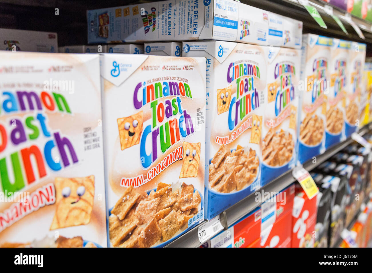 boxes of Cinnamon Toast Crunch cereal on shelves at a grocery store Stock Photo Alamy