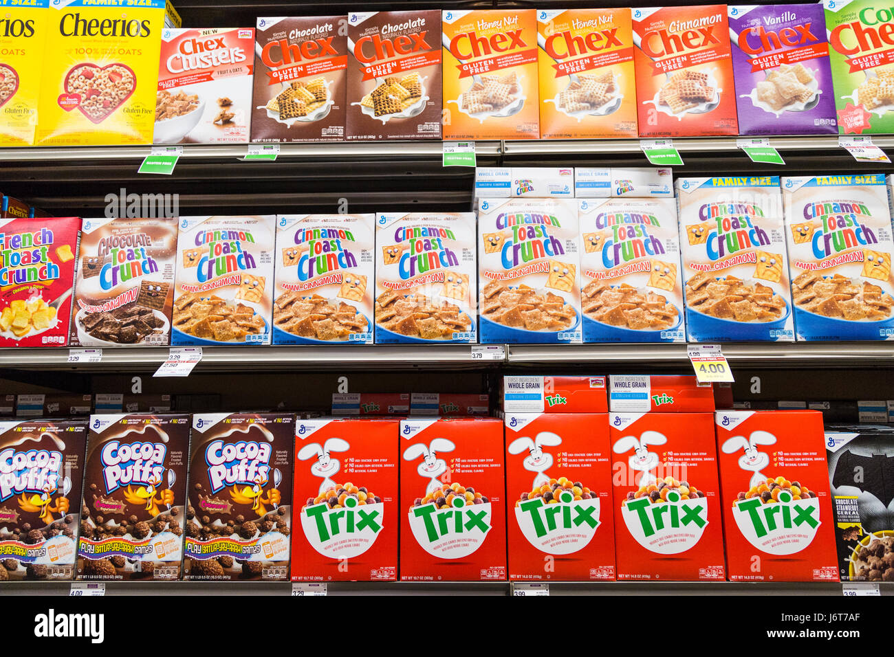 boxes breakfast cereal on shelves at a grocery store Stock Photo