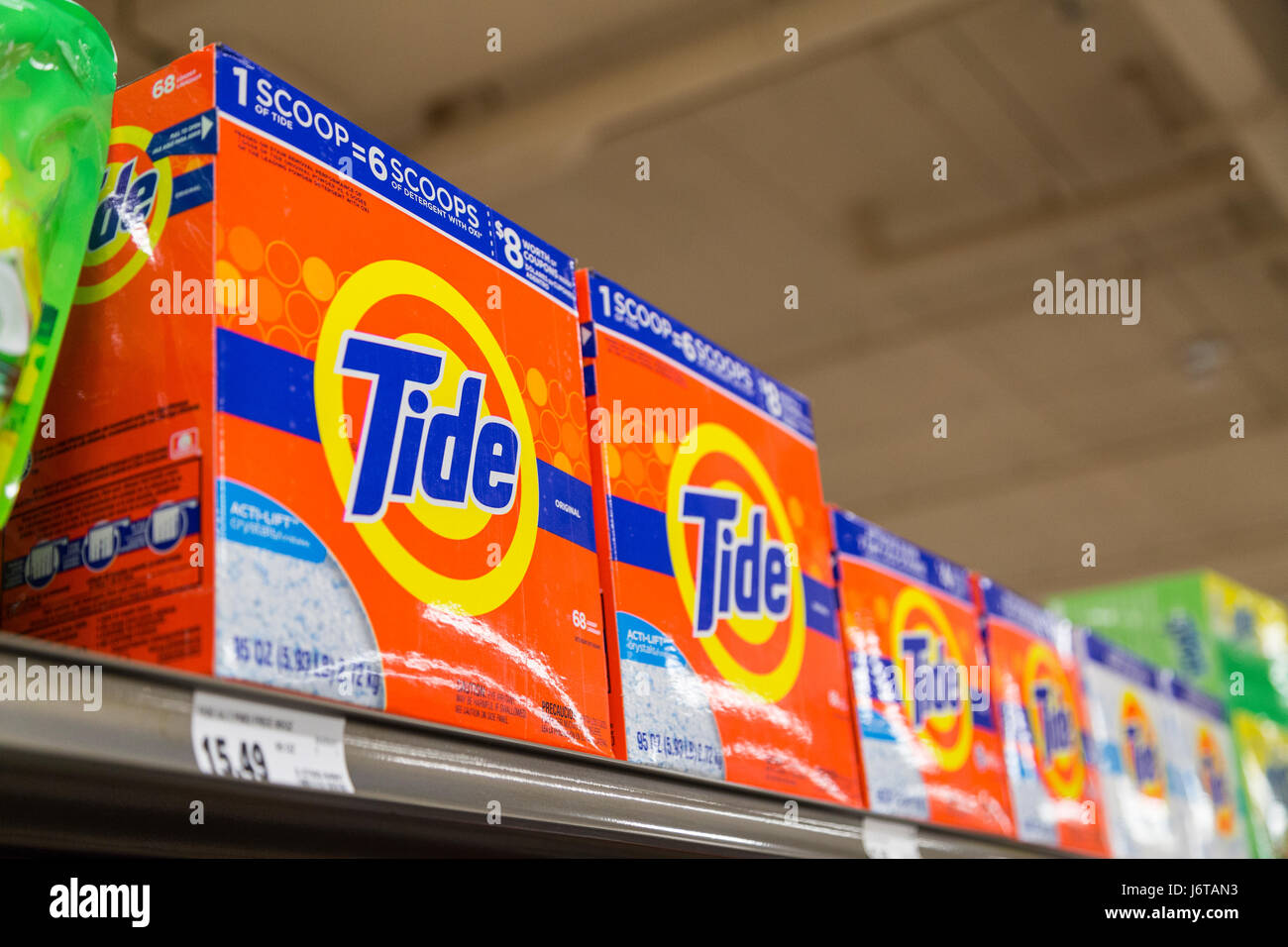 A row of Tide brand powder laundry detergent boxes on grocery store shelves Stock Photo Alamy