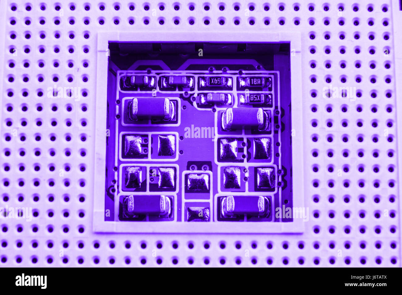 CPU socket on a computer motherboard macro close Stock Photo - Alamy