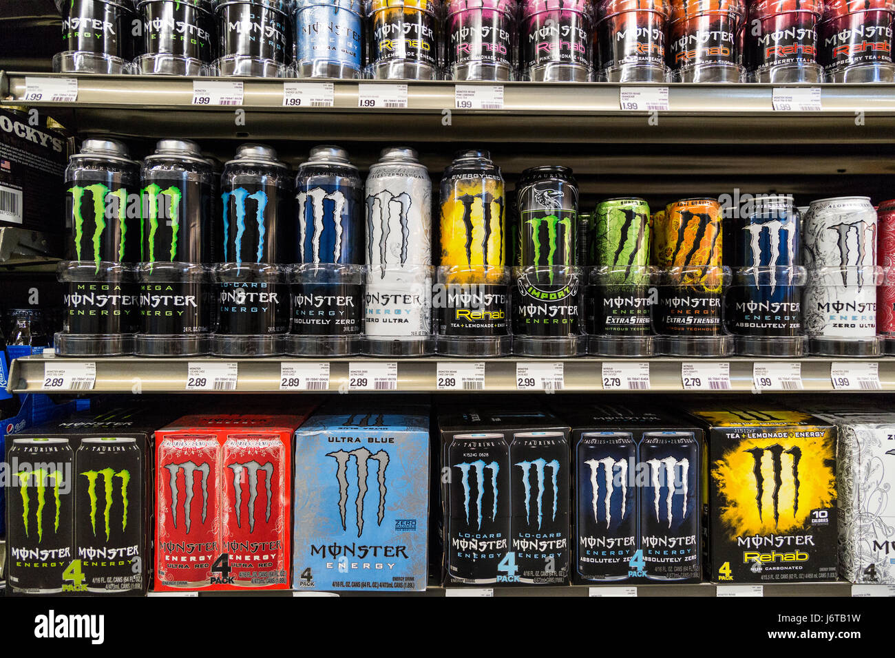 A display of Monster energy drinks cans on the shelves of a grocery store  Stock Photo - Alamy