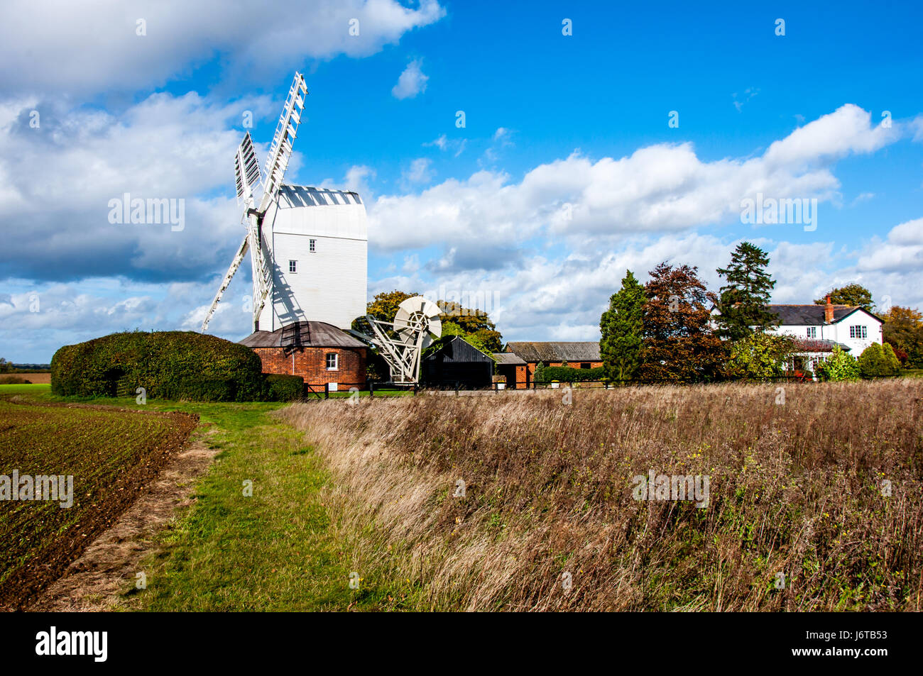 Landscape photography of Aythorpe Roding windmill with field of crops ...