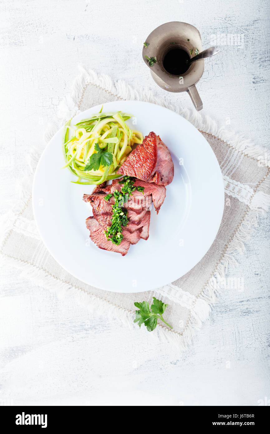 Zucchini pasta and meat Stock Photo