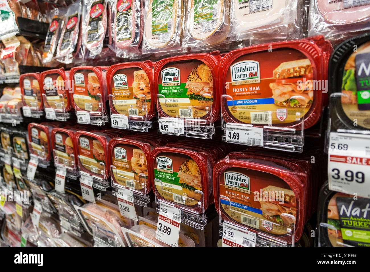 containers of Hillshire Farms packaged sliced sandwich meat on the  refrigerator shelves of a grocery store Stock Photo - Alamy