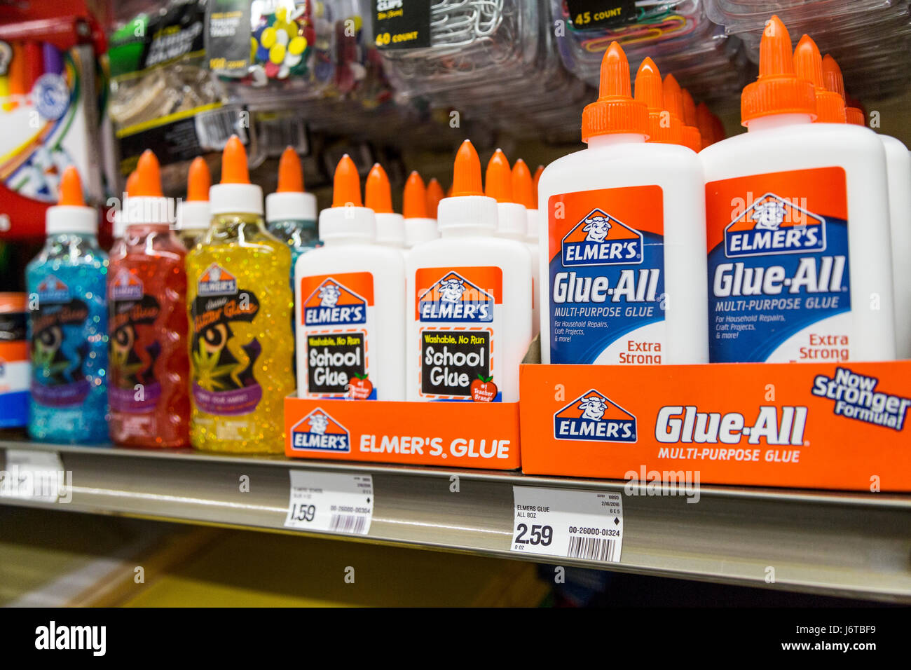 rows of Elmer's glue on the self of a store Stock Photo - Alamy