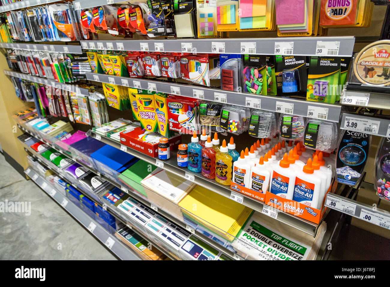 shelves of office supplies on display shelves at a retail store Stock Photo