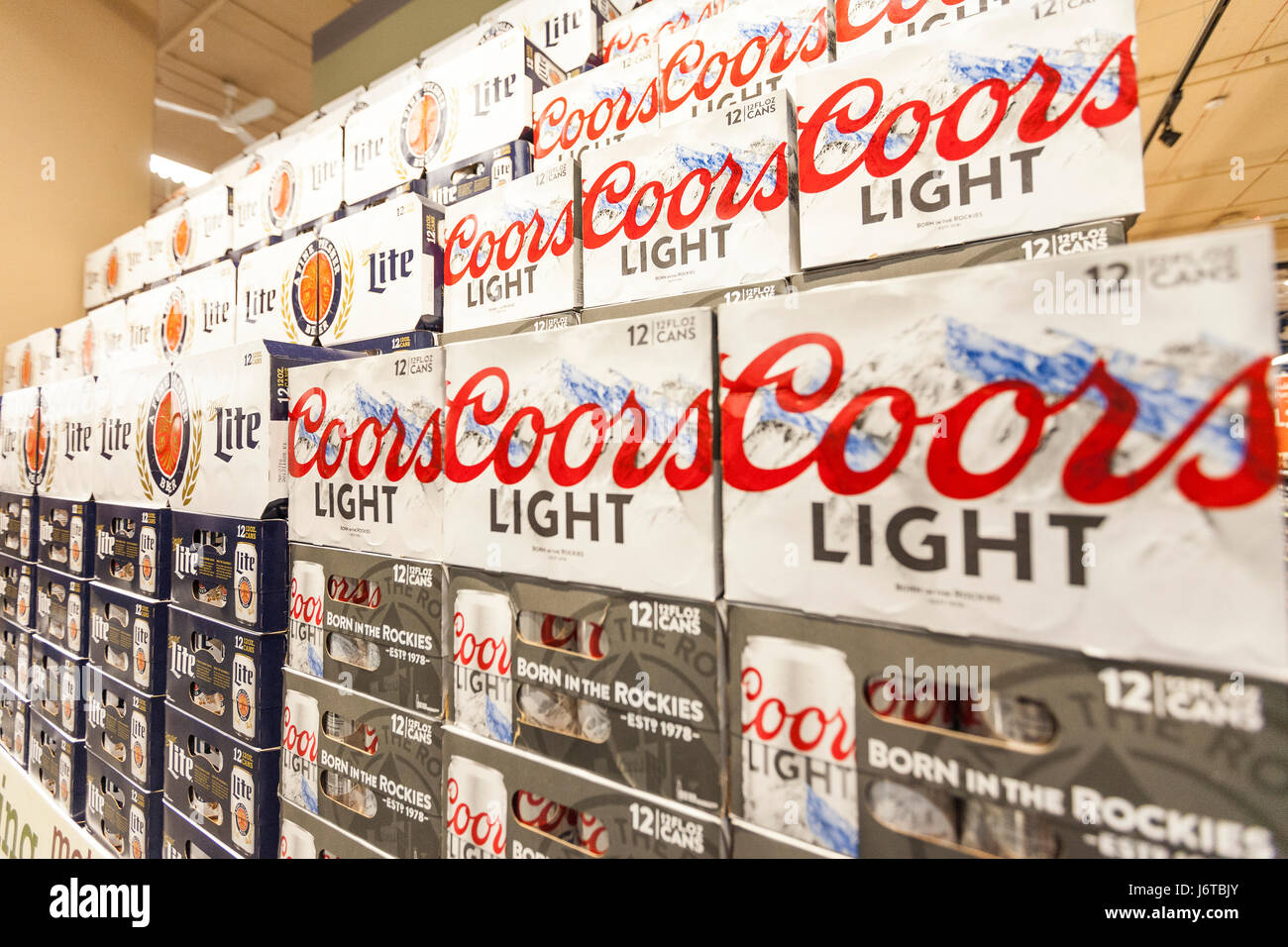 Cases of Coors Light and Miller Lite beer on display and for sale in a grocery store Stock Photo