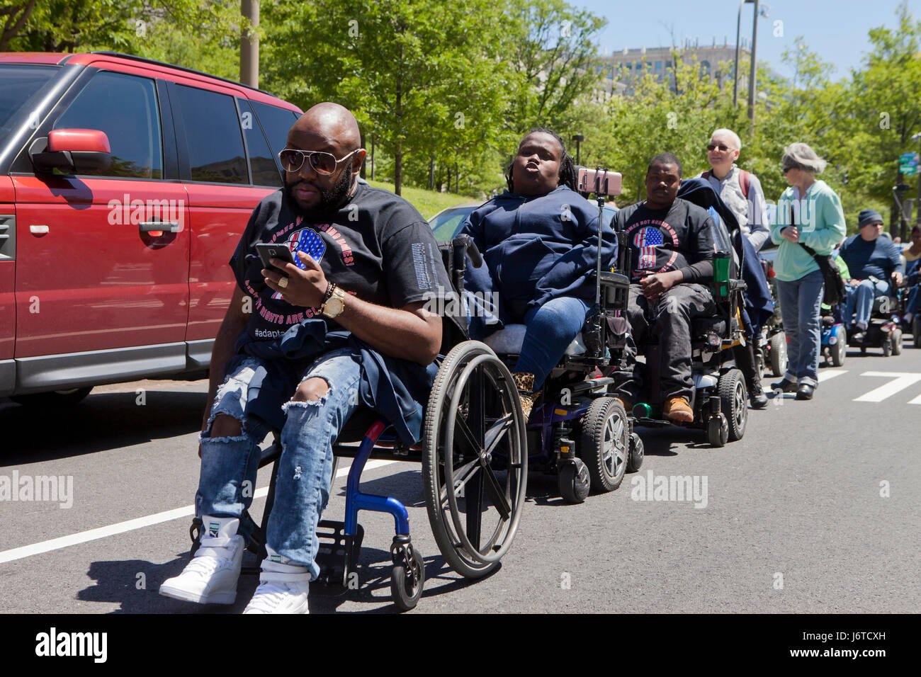 May 15, 2017, Washington, DC USA:  Members of ADAPT and disability activists, many in wheelchairs, protest and demand disability rights. Stock Photo