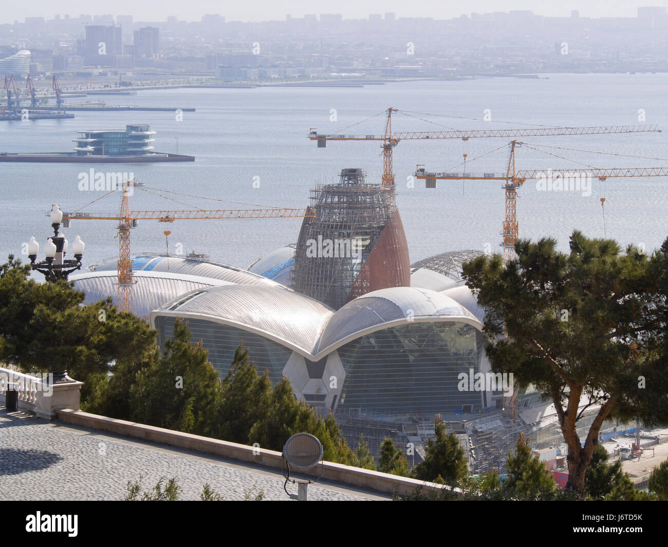 Baku, the capital city of Azerbaijan, on the shore of the Caspian sea, view of  the building of a new shopping centre from the Dagustu park Stock Photo
