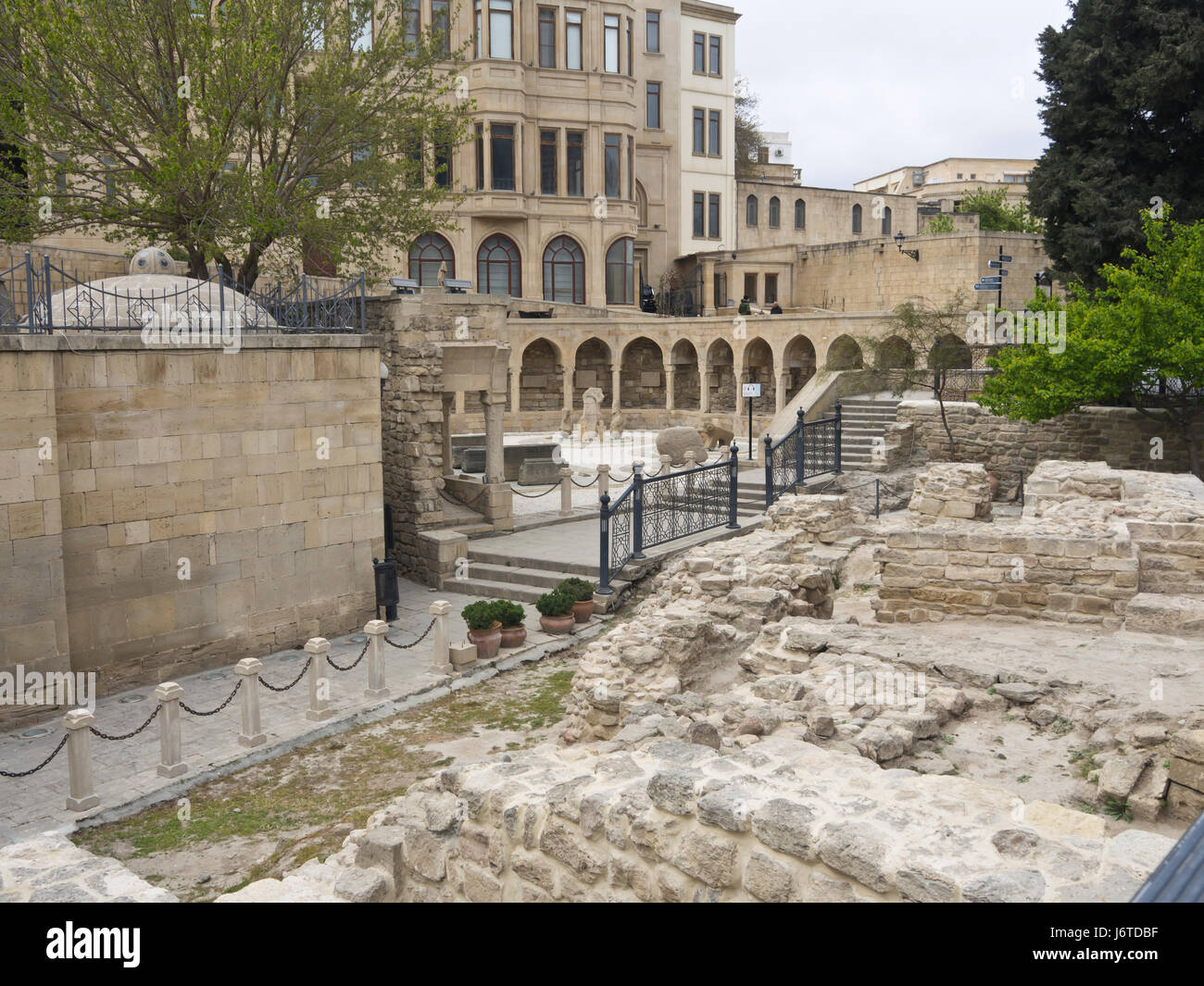 Baku old town, Icheri sheher, inner city surrounded by fortification walls, Unesco World heritage site, pedestrian walkway through old remains Stock Photo