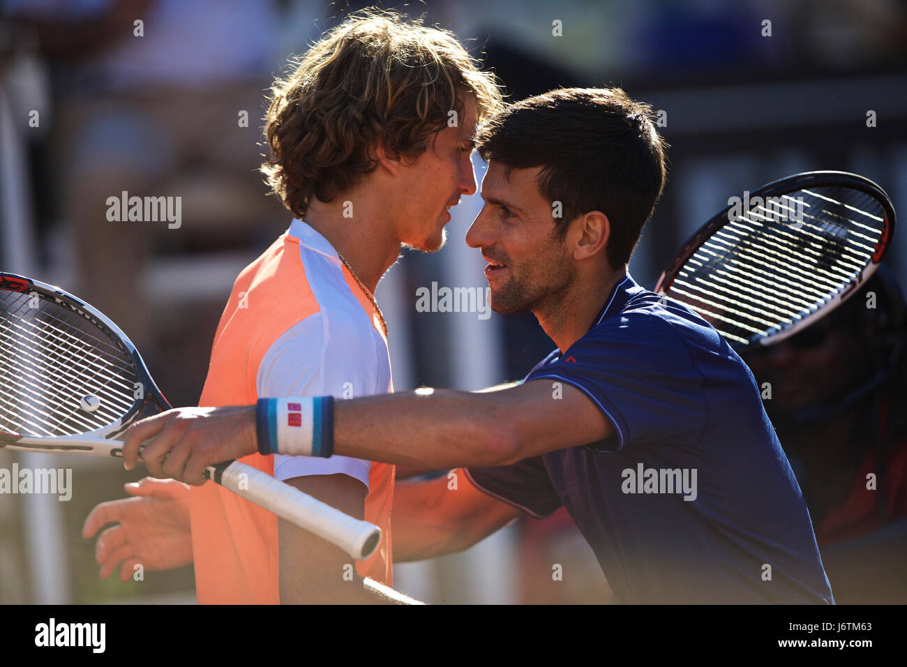 Rome, Italy. 21st May, 2017. Novak Djokovic (R) of Serbia hugs Alexander  Zverev of Germany at the end of their final match of men's singles at the  Italian Open tennis tournament in