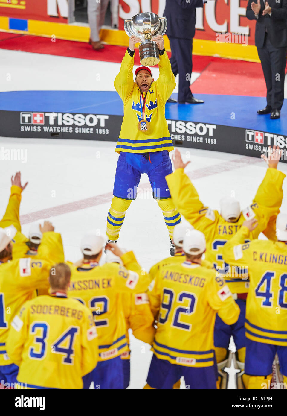 With trophy celebrates their victory hires stock photography and