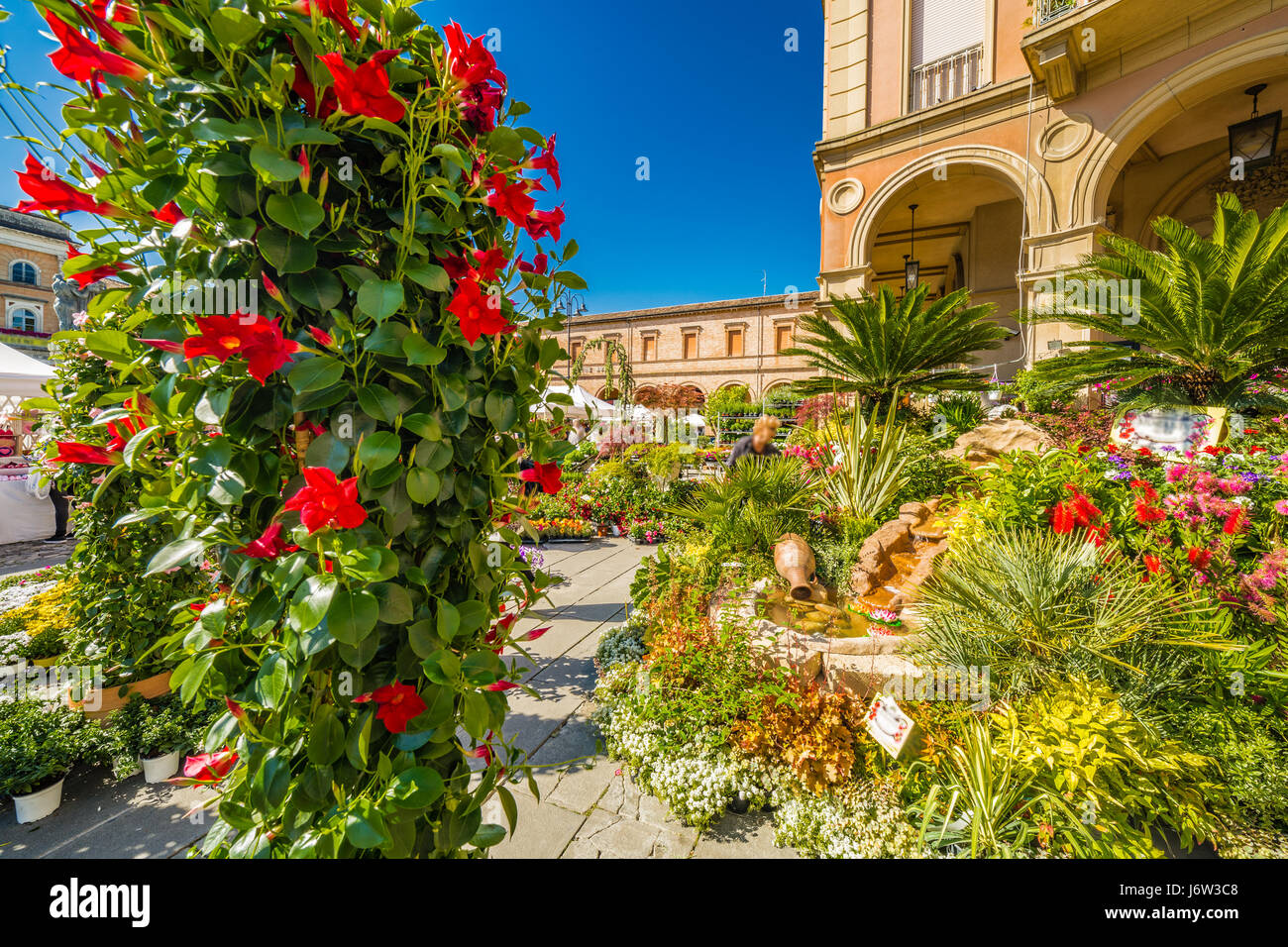Flower fair in medieval village in Italy Stock Photo - Alamy