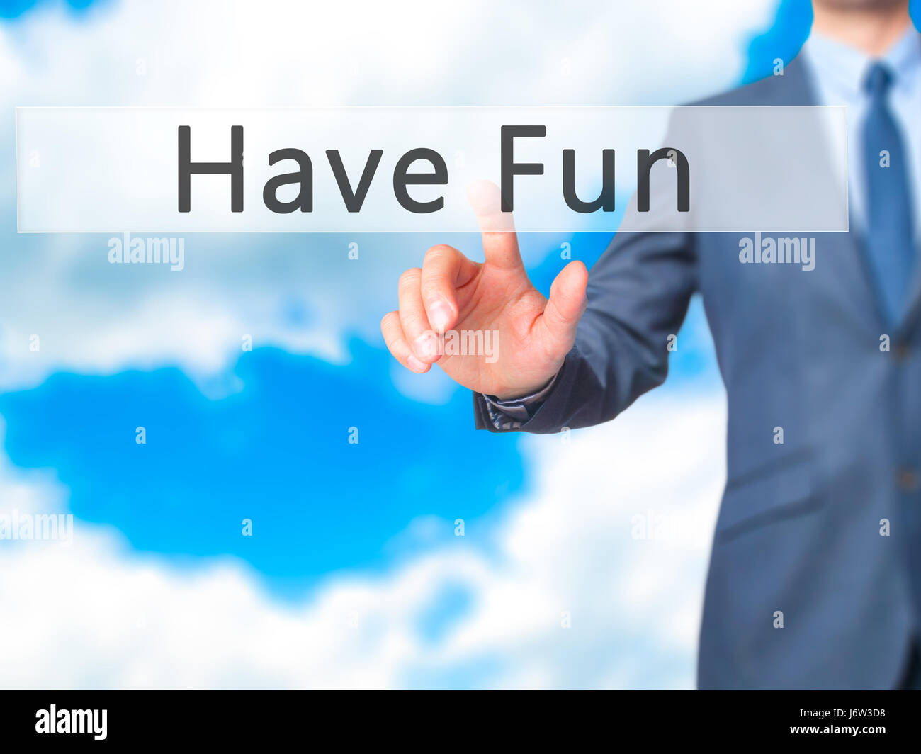 Have Fun - Businessman hand pressing button on touch screen interface ...