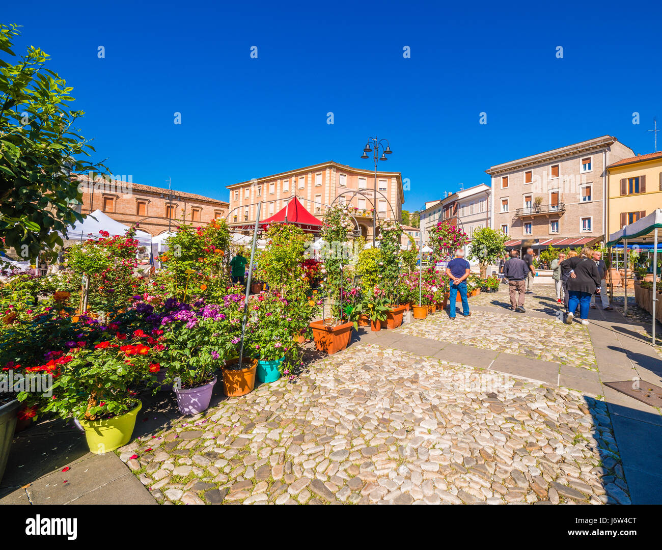 Flower fair in medieval village in Italy Stock Photo - Alamy