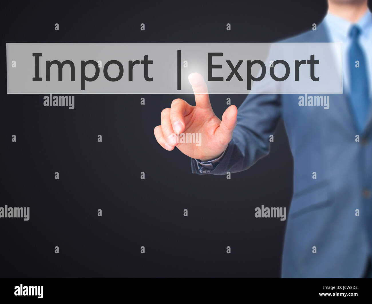 Import Export - Businessman hand pressing button on touch screen ...