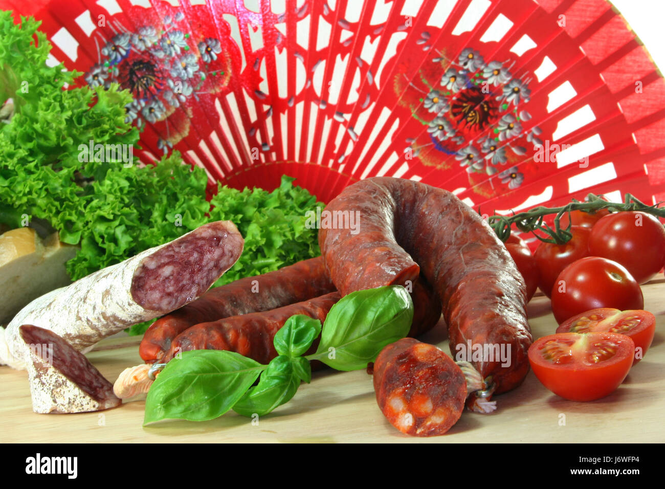 spain fan parsley salami hard cured sausage sausage snack time dainty food dish Stock Photo