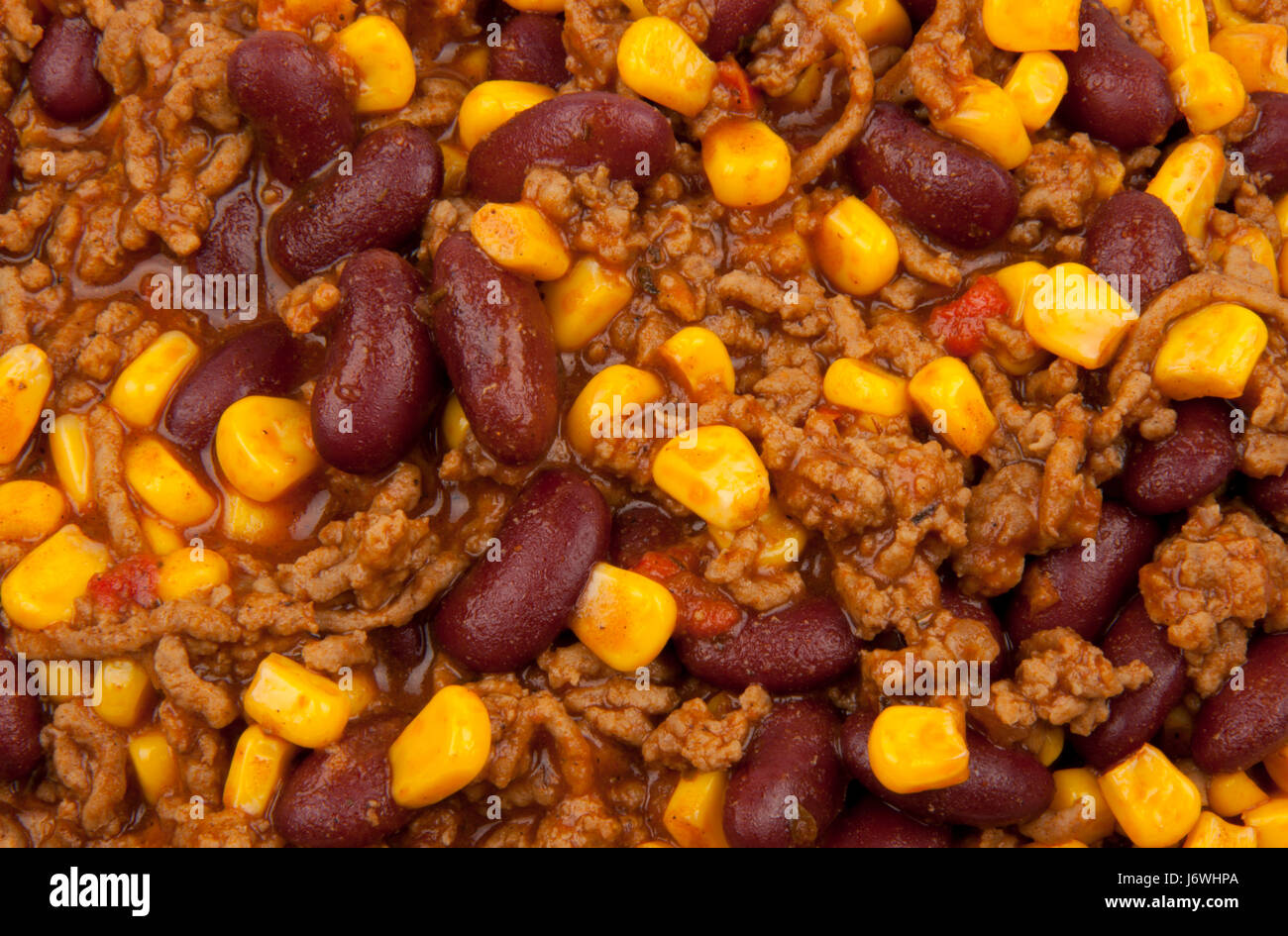 beans corn bean chilli chili meat minced hacked food dish meal cooked red Stock Photo