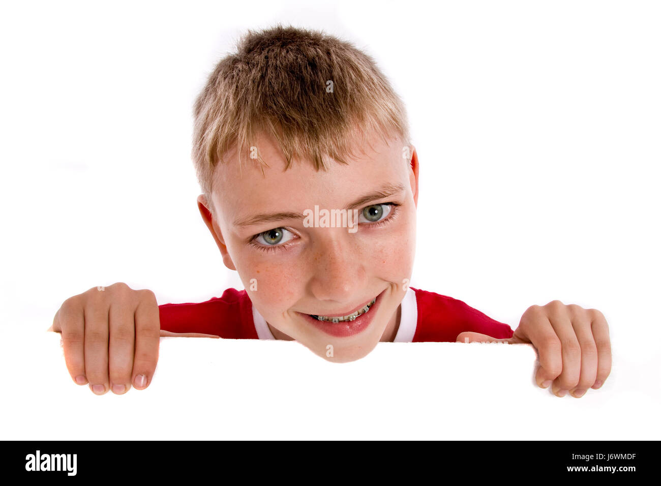 boy looks around the corner 280610-2 Stock Photo