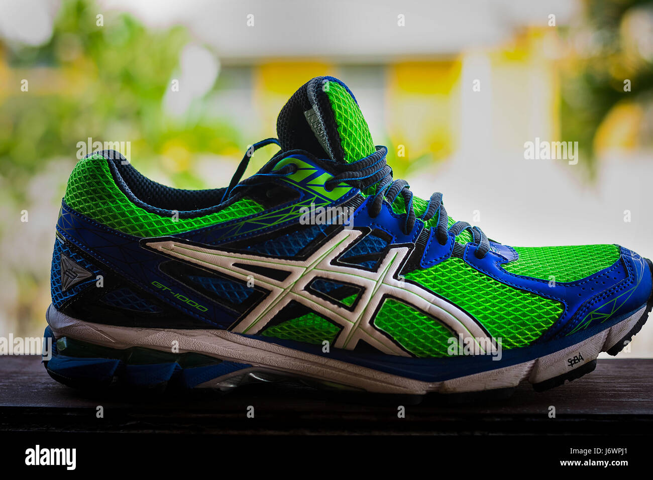 Asics Shoes pictures for advertising in print or on billboards Stock Photo  - Alamy
