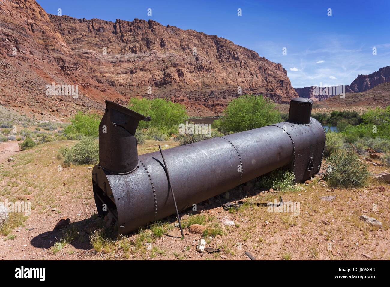 Old Rusted Steamship Boiler on Site of historic Lee's or Lee Ferry Crossing of Colorado River near Page, Arizona Stock Photo