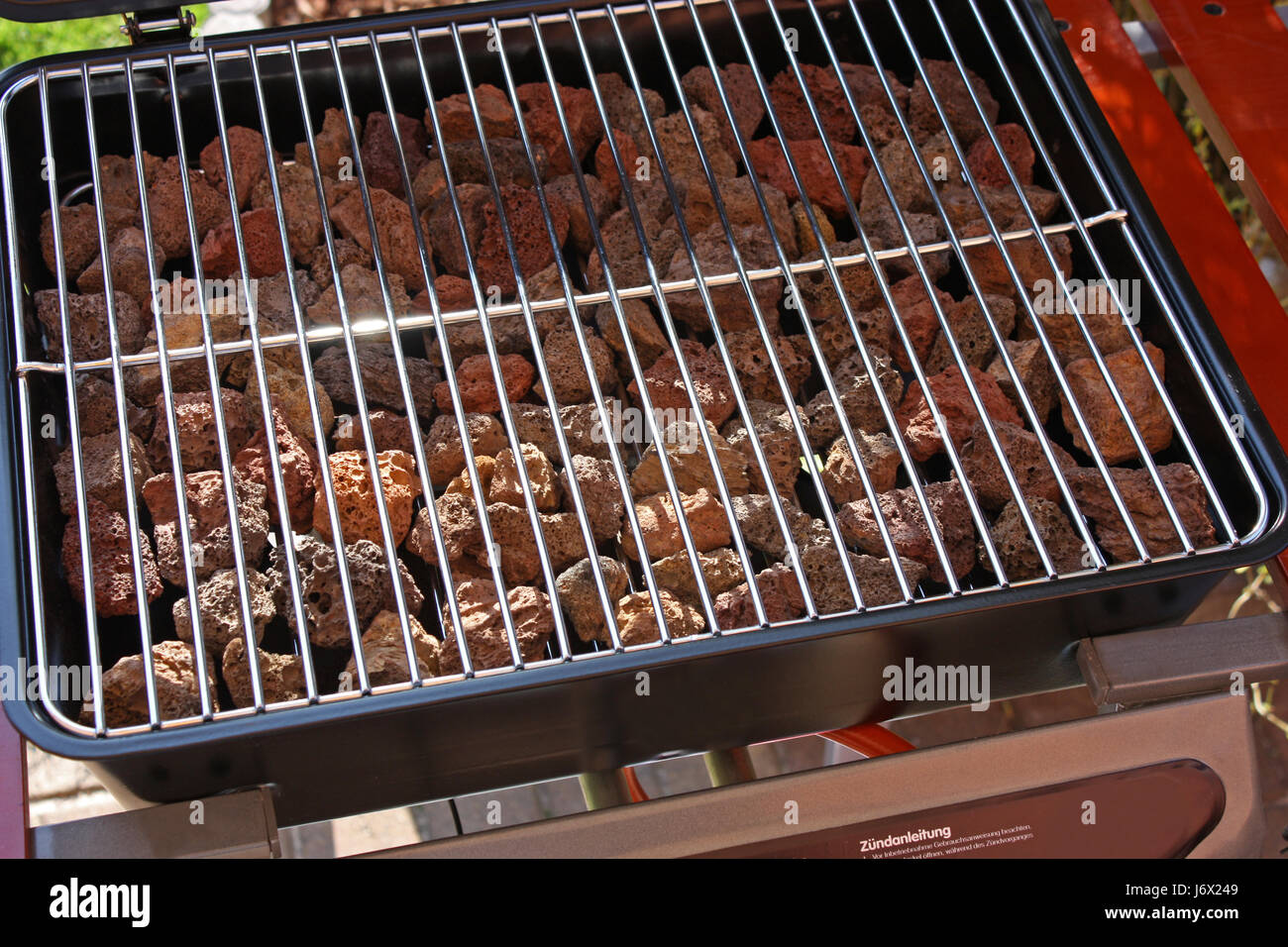 gas grill with lava stones Stock Photo - Alamy