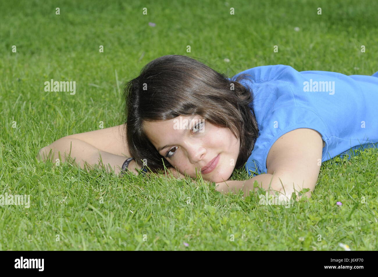 teenage girl on a meadow Stock Photo - Alamy