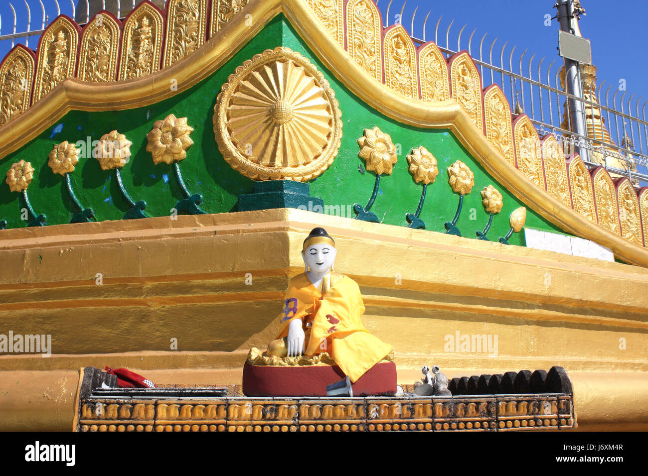 Old stone statue of meditating Buddha, Shwemawdaw Paya temple (Golden Temple), Bago, Bago Region, Myanmar (Burma) Stock Photo