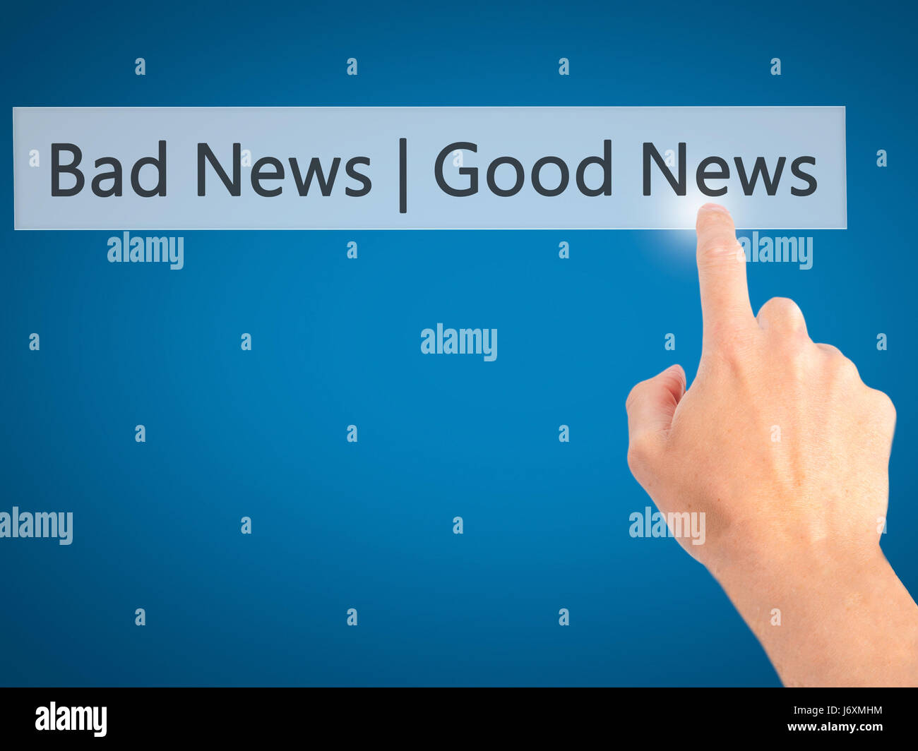 Good News Bad News - Hand pressing a button on blurred background concept . Business, technology, internet concept. Stock Photo Stock Photo