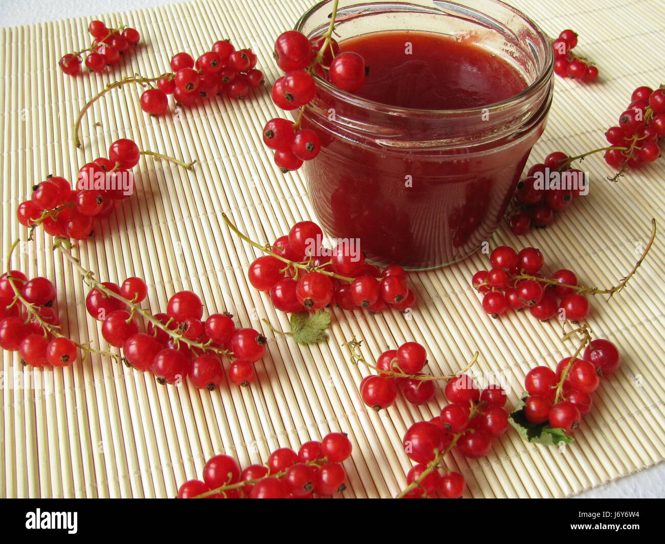 jam ruddiness red sweetly progenies fruits berries black currants jelly Stock Photo