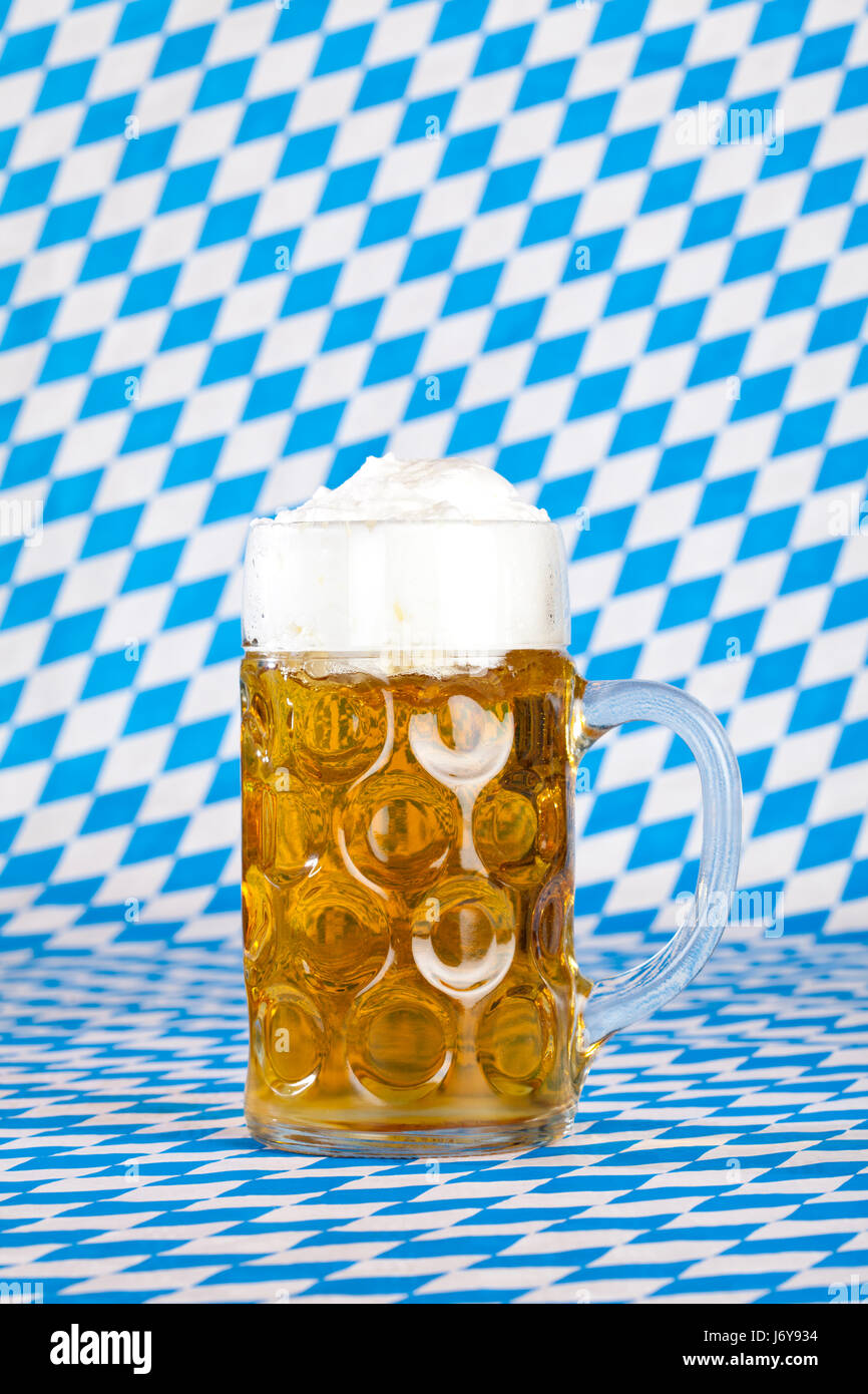 oktoberfest mug of beer with froth Stock Photo Alamy