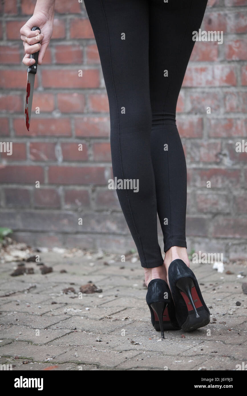 woman crime victim blood killer violence dead arm weapon knive knife