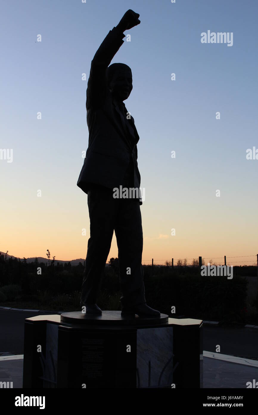 Silhouette statue of Nelson Mandela in front of the Victor Verster Prison, now Drakenstein Correctional at Paarl, South Africa Stock Photo