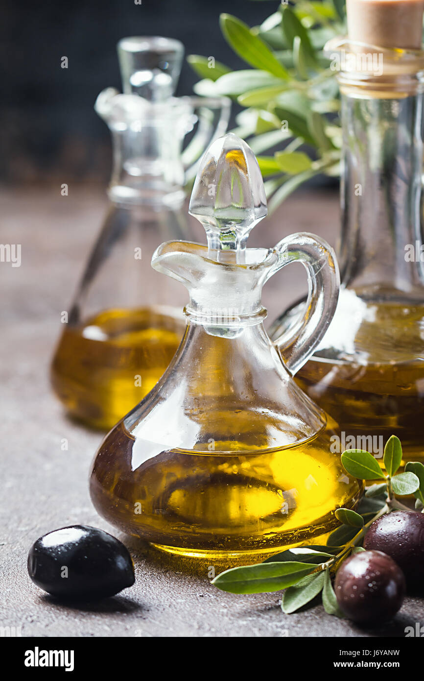 Olive oil and olive branch Stock Photo - Alamy
