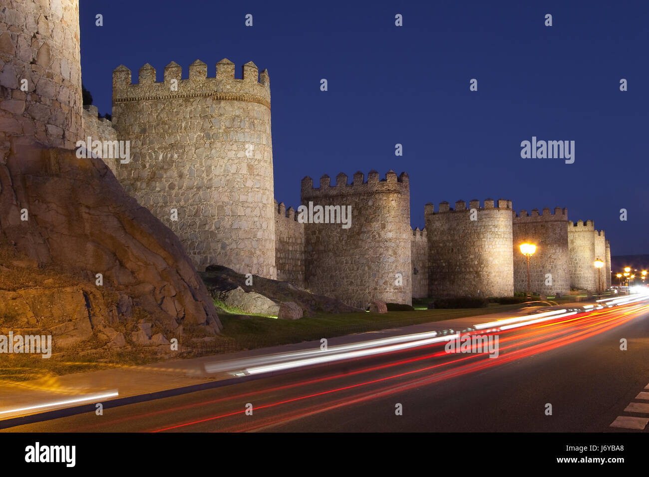 stone europe spain towers walls night nighttime style of construction