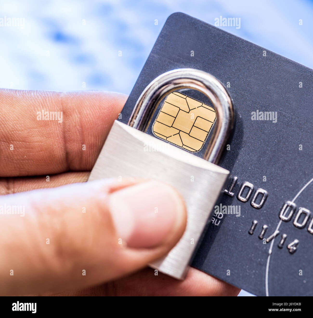 Credit cards and simle mechanical lock. Security concept. Stock Photo