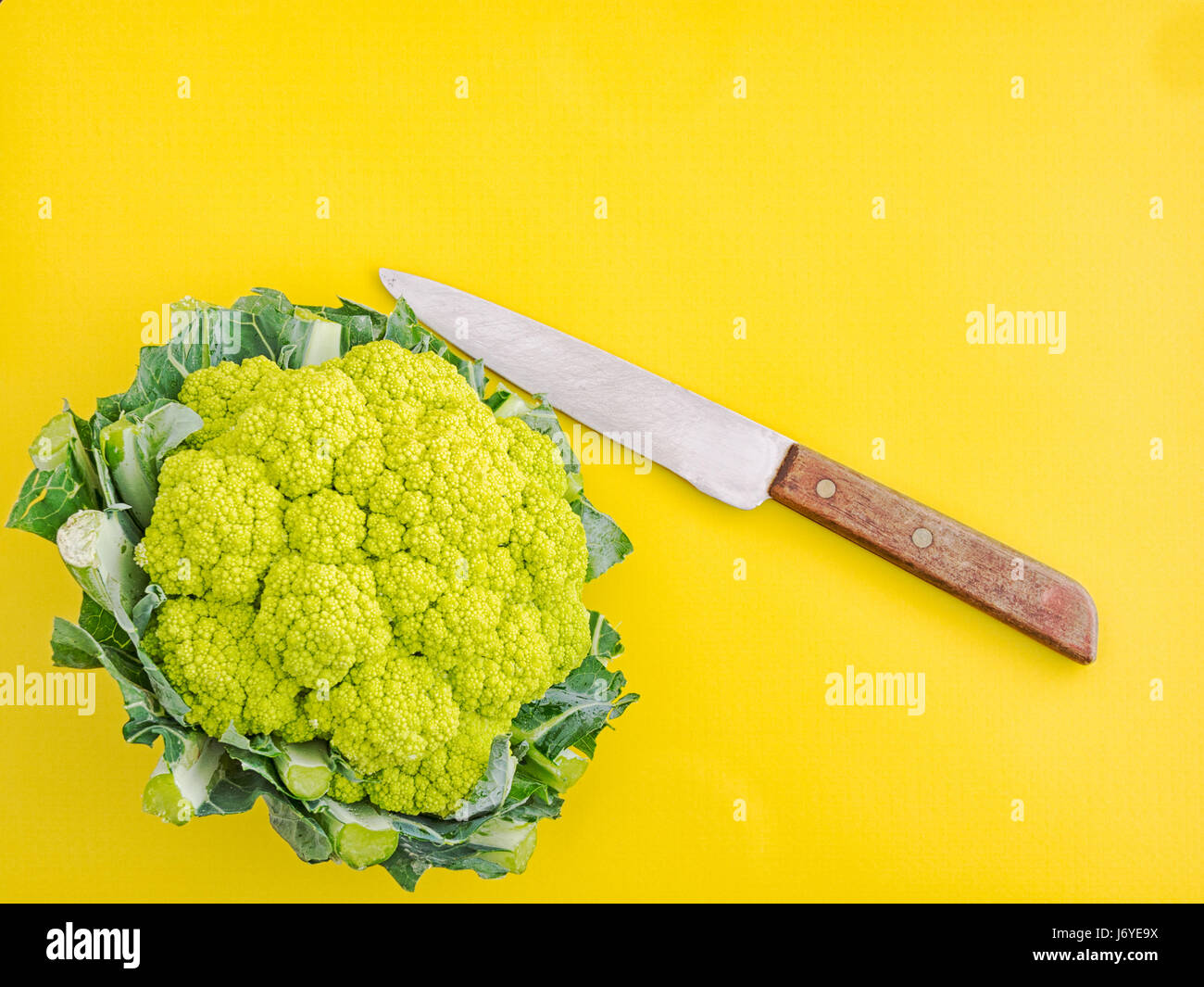 Green cauliflower. Healthy vegetable high in vitamins, minerals and micro nutrients. Stock Photo