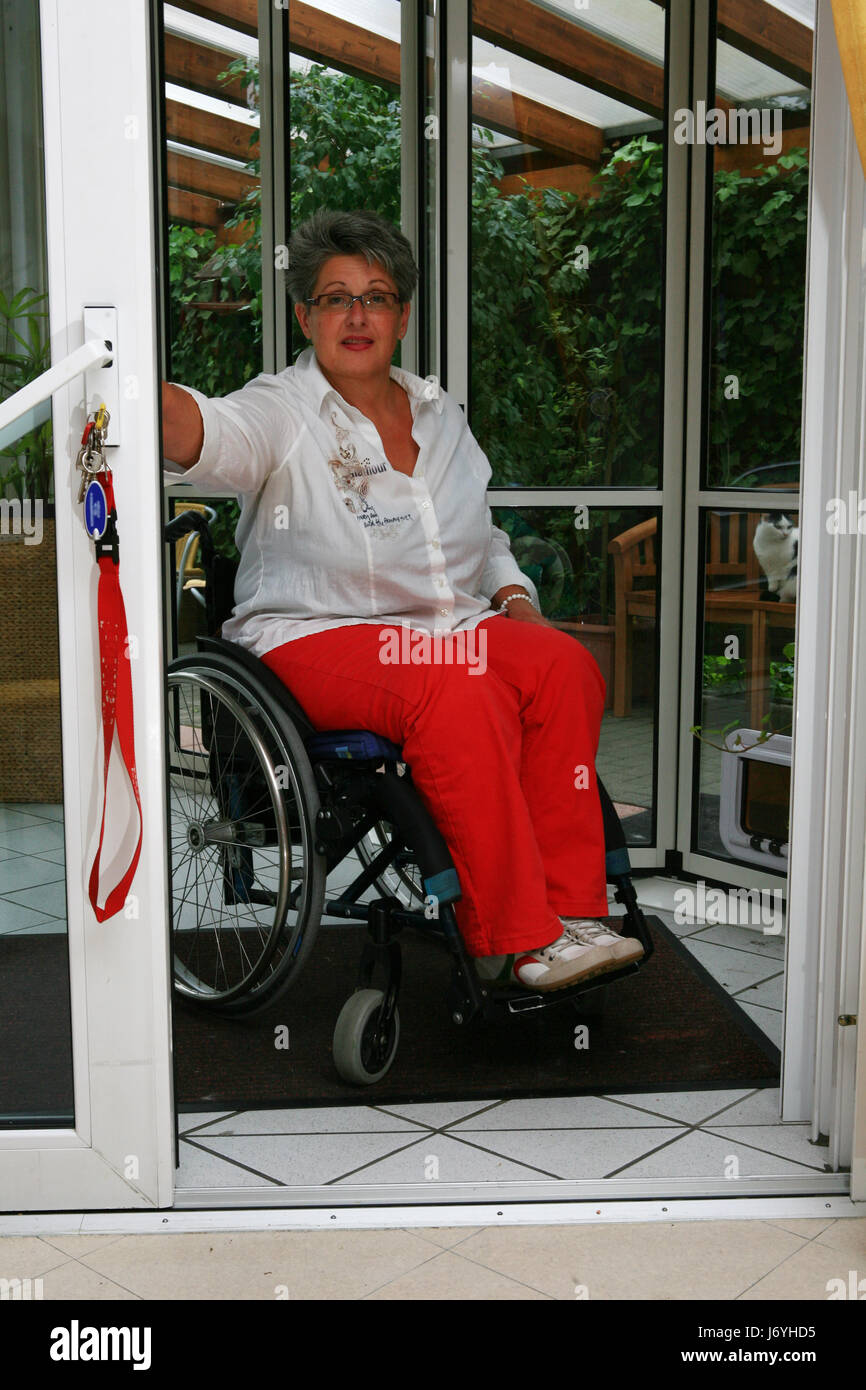 woman wheelchair everyday life aid wheelchair user problems home flat