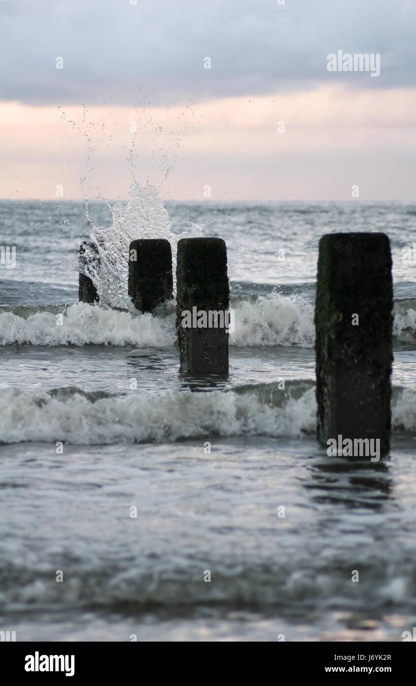 breakwater in the surf Stock Photo