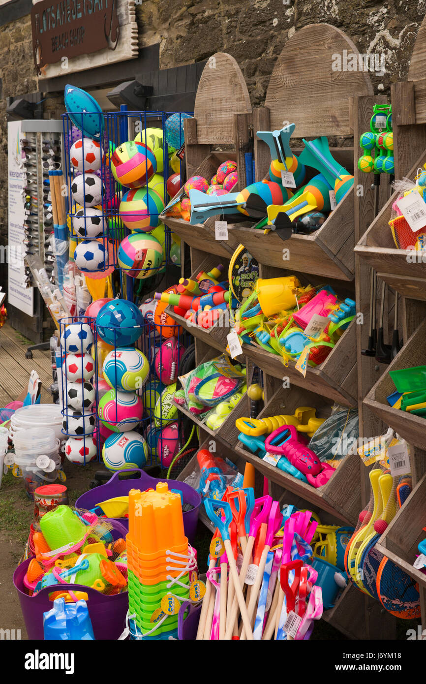 UK, Cornwall, St Austell, Polkerris, colourful plastic beach toys in seaside shop Stock Photo