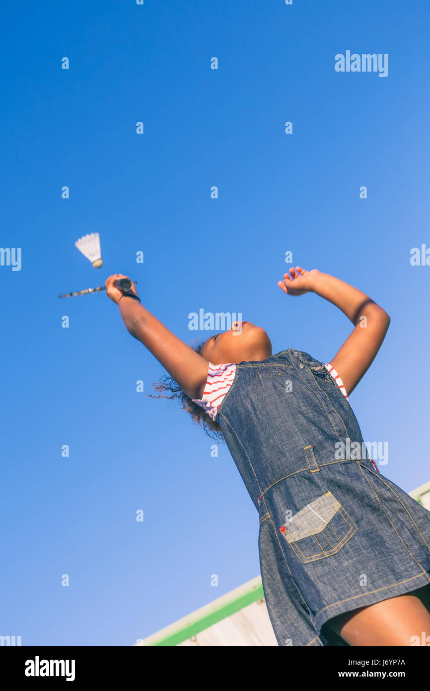 Girl playing badminton Stock Photo
