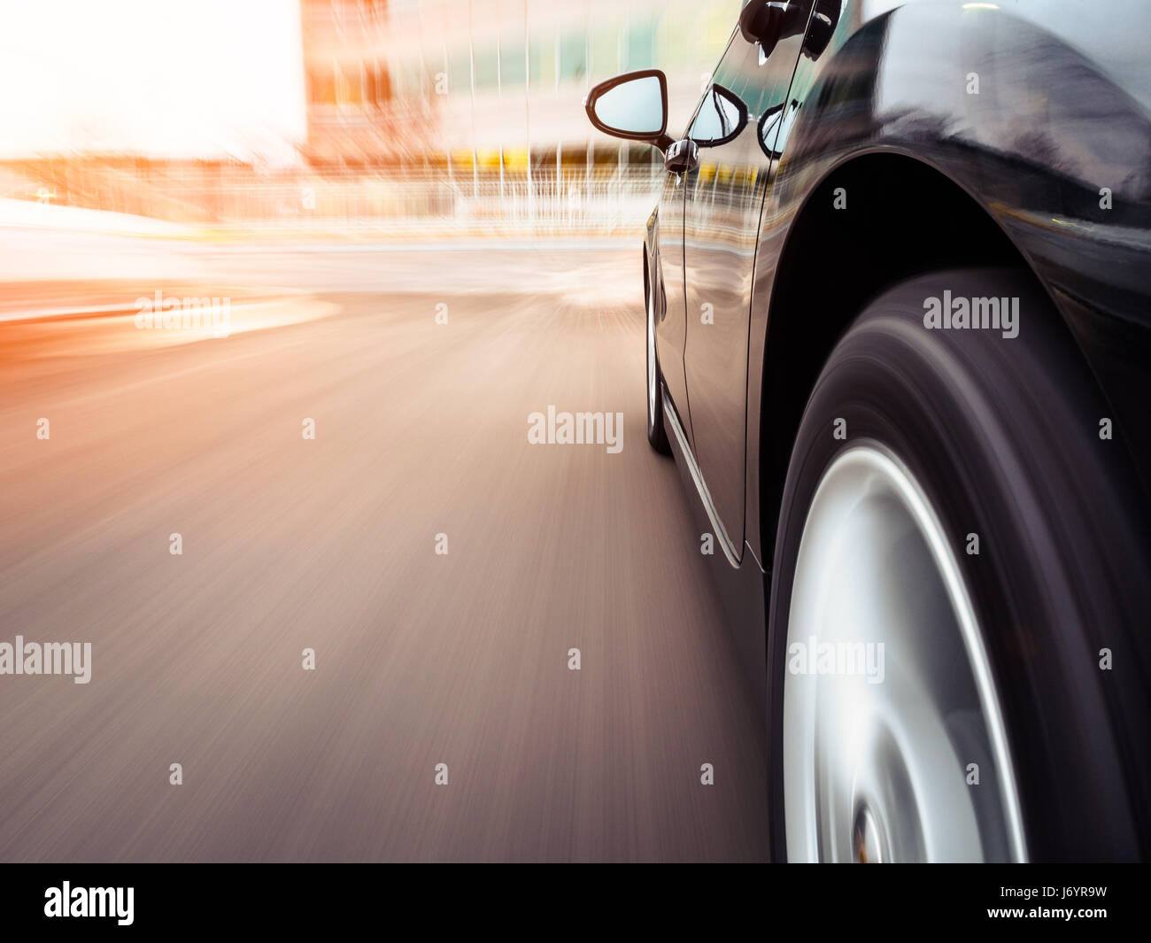 Car speeding towards an office, Illinois, United States Stock Photo