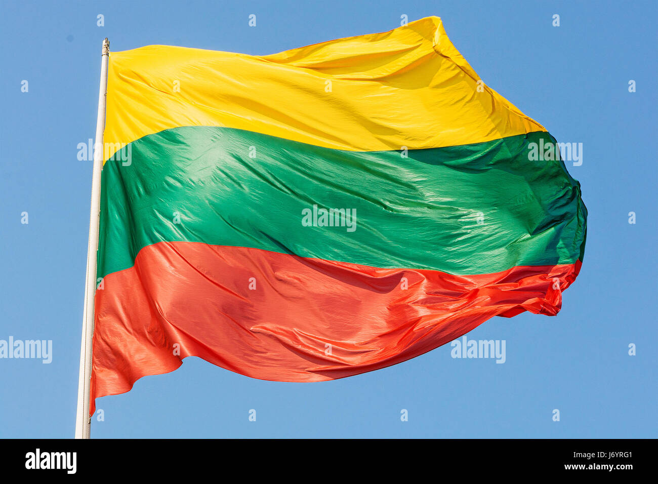 Lithuanian flag blowing in the wind Stock Photo