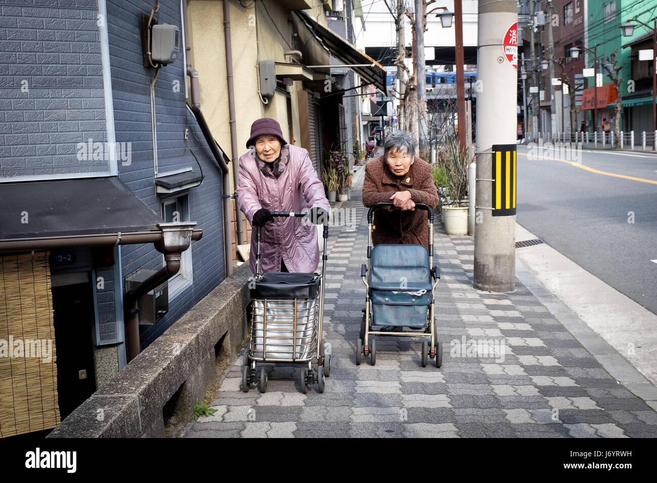 Two elderly women in Osaka, Japan. Stock Photo