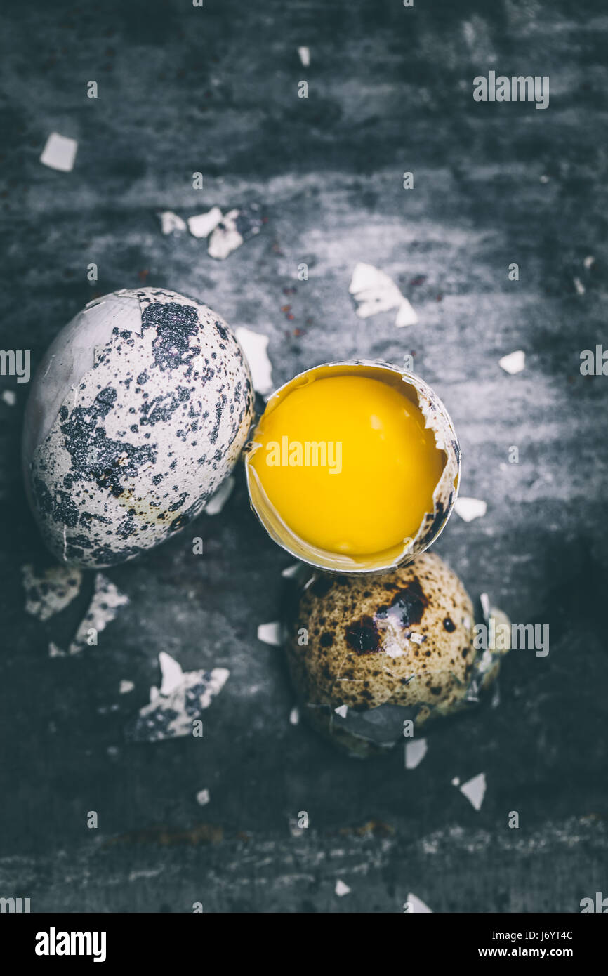 Quail egg, shell and yolk Stock Photo