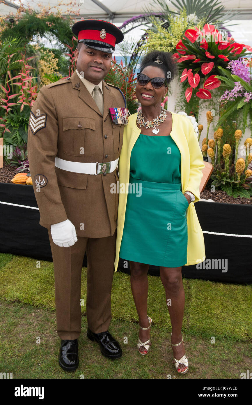 Victoria Cross recipient Johnson Beharry with Floella Benjamin attend the press preview of the RHS Chelsea Flower Show at the Royal Hospital Chelsea, London. Stock Photo